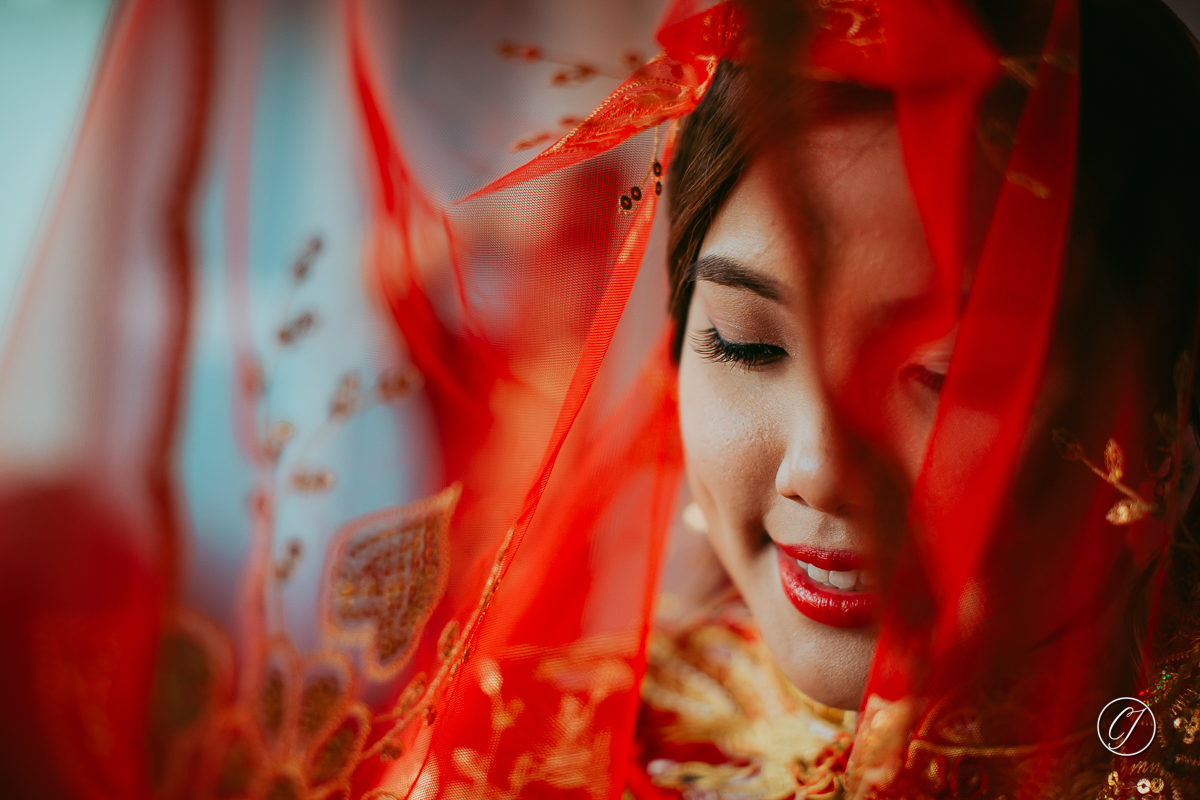 Bride in red veil