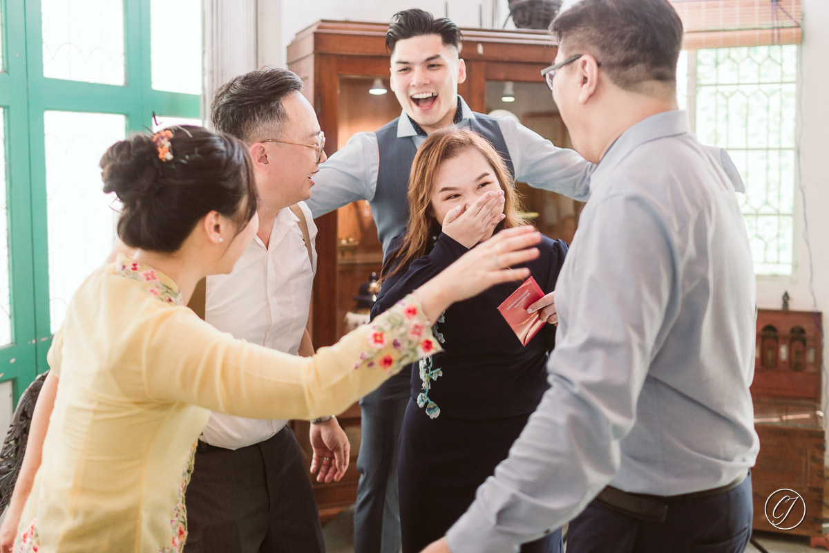 Happy moment when family hugged together during the tea ceremony